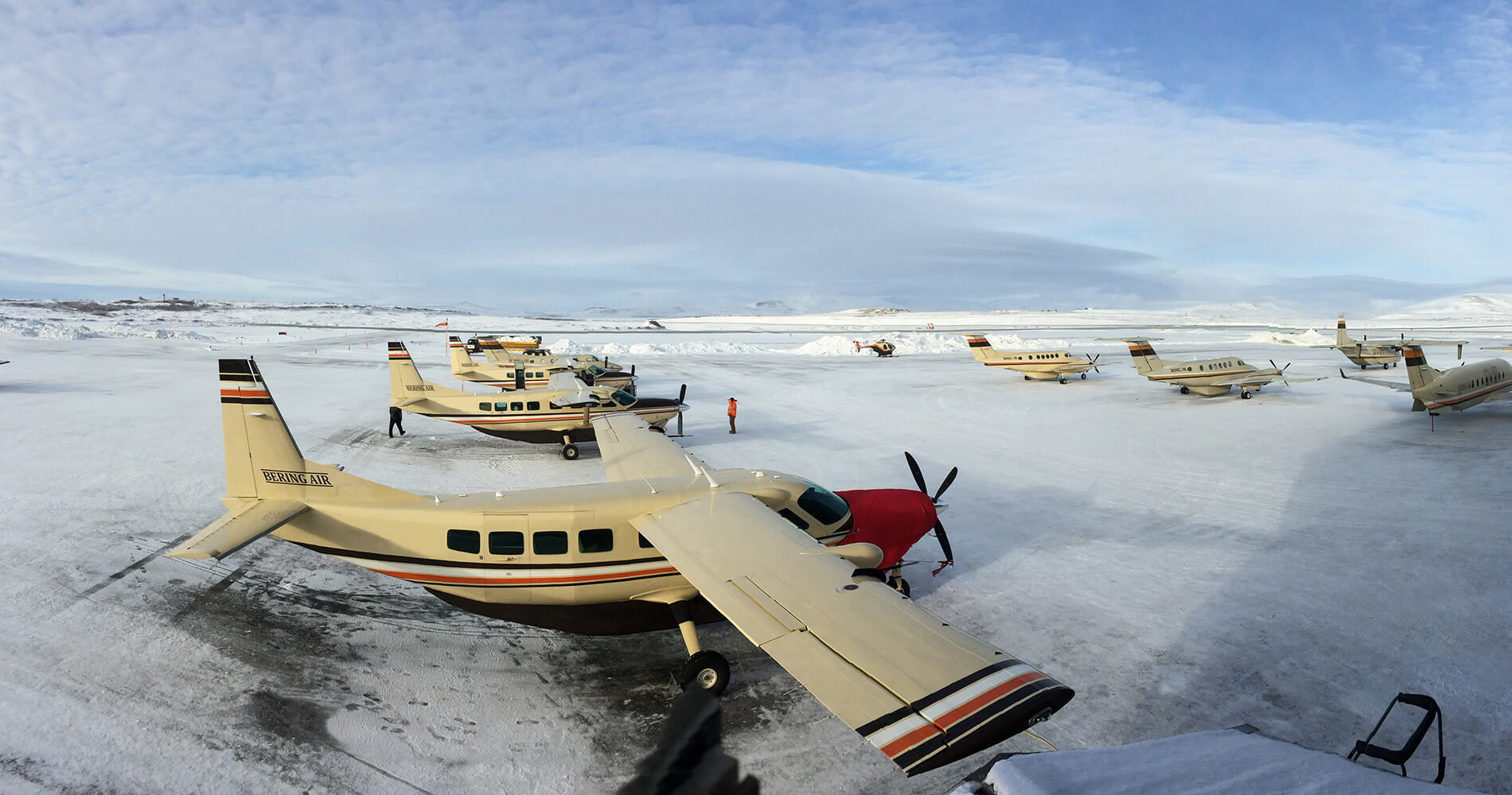 Rows of Cessna Caravans on a snowy ramp